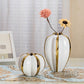 Vase Luxueux Blanc Brillant Orné de Doré